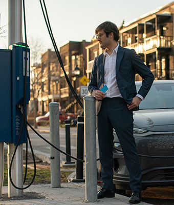 Gentleman at an EV charging station