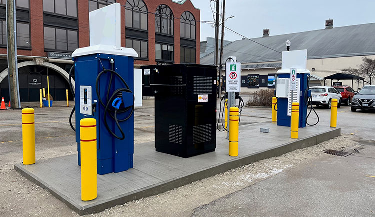 An EV charging station in a parking lot