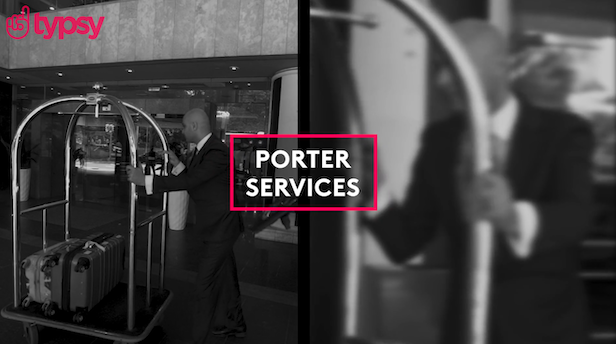 Porter pushing bell cart into the hotel lobby